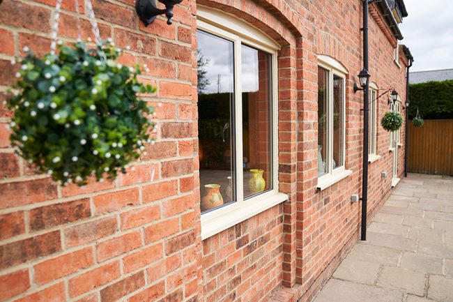Cream Aluminium Windows on a heritage home transformation