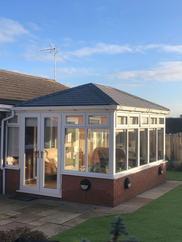 conservatory with tiled Equinox roof 