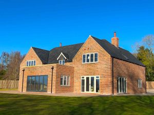 new build property with bifolds and casement windows