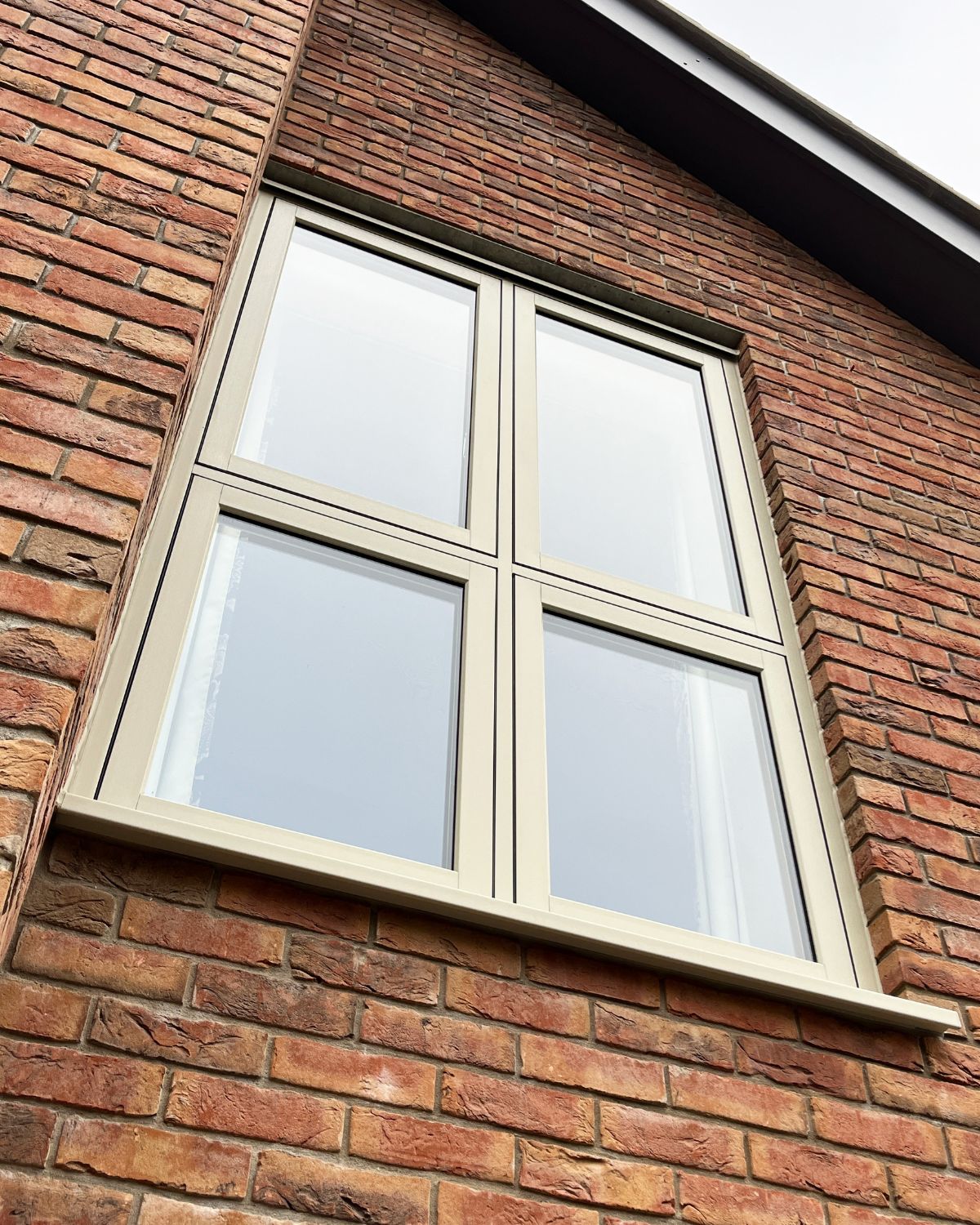 Pebble Grey Heritage Flush Windows, Aluminium Bifolds and Slate Grey Entrance Door