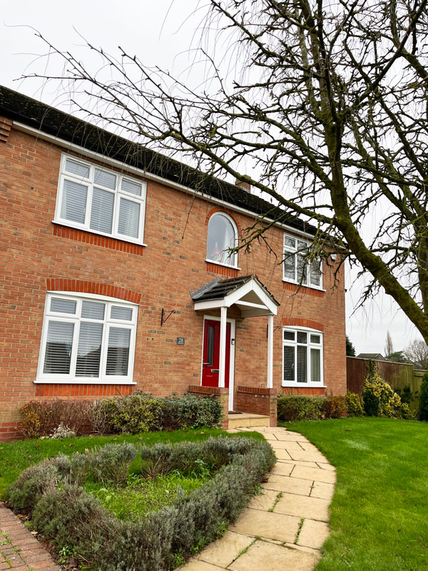 Red Composite Door with uPVC Casement Windows