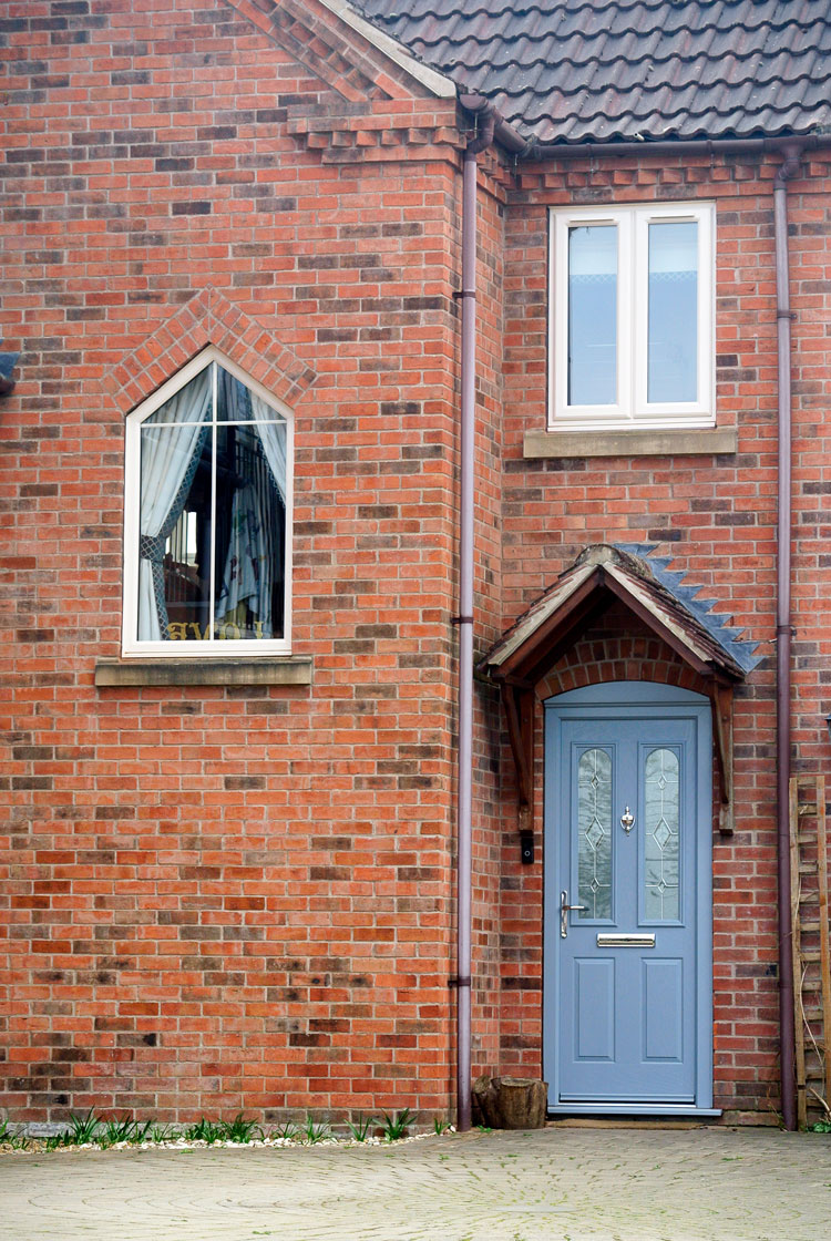 Home Transformation with Replacement Windows and Moondust Grey Composite Door