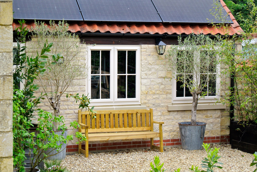 Cream foil cottage window with astragal bar detail