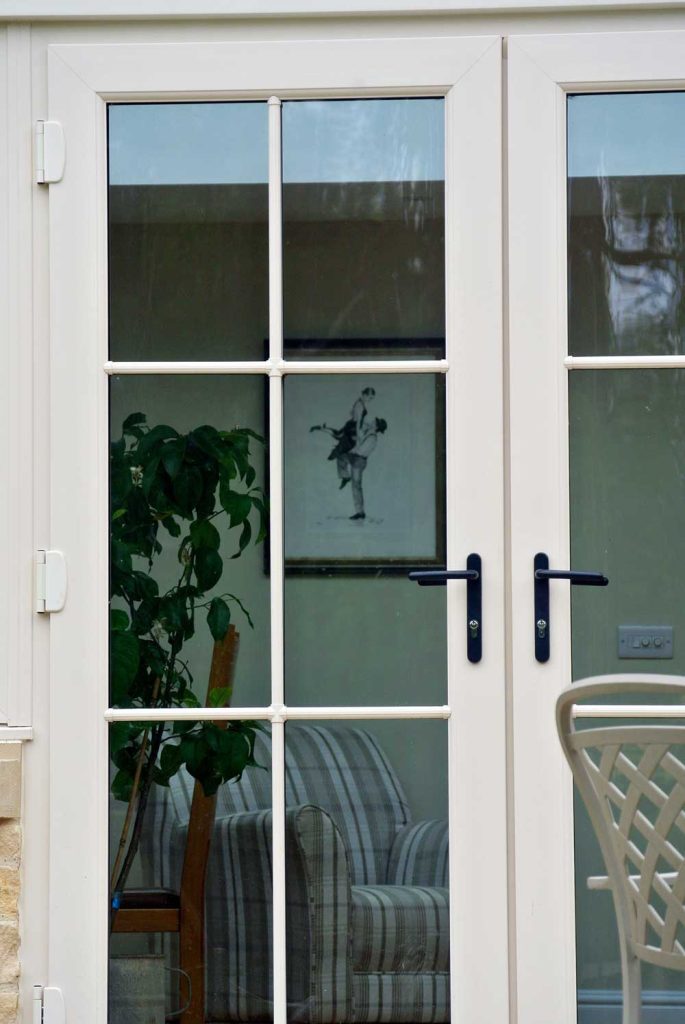 French door astragal bar and black hardware