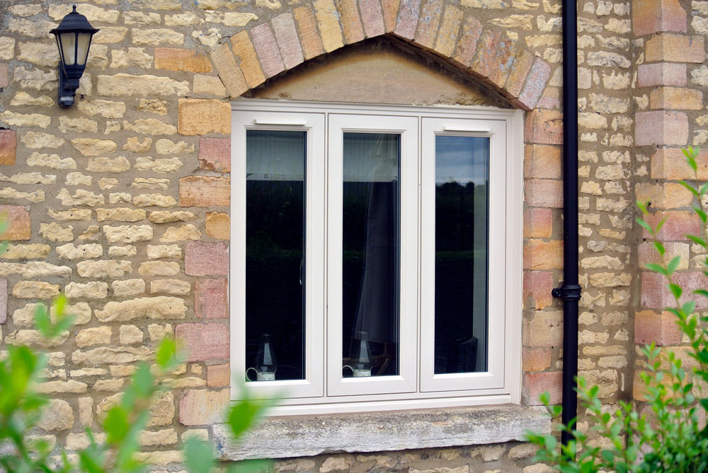 three pane cream flush casement windows