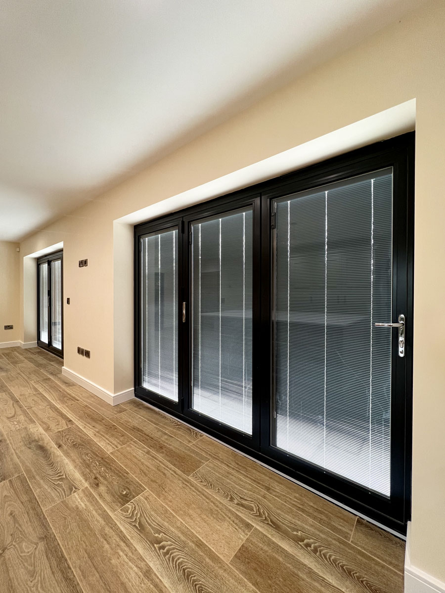 Bifold Doors with Integral Blinds Elevate Modern Home
