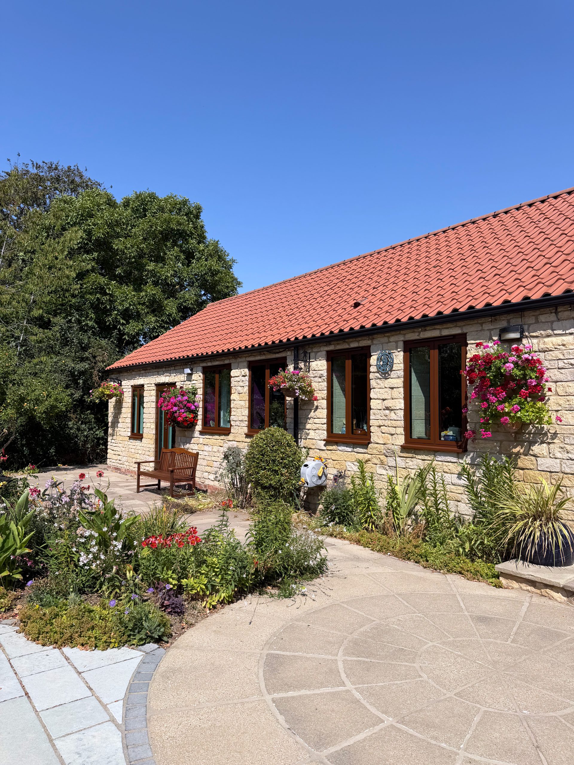Brown Aluminium Flush Windows Transform Stone Cottage