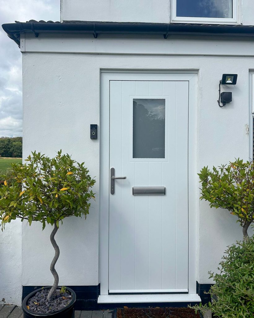 white cottage style spitfire door